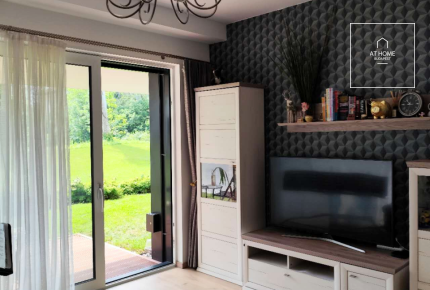 Modern ground-floor apartment with a 20 m² terrace and garden access in District XII