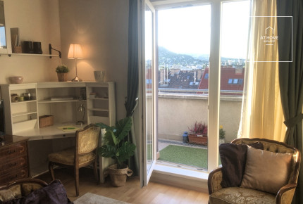 Top-Floor Apartment with Panoramic Views and 25 m² Terrace in District XI