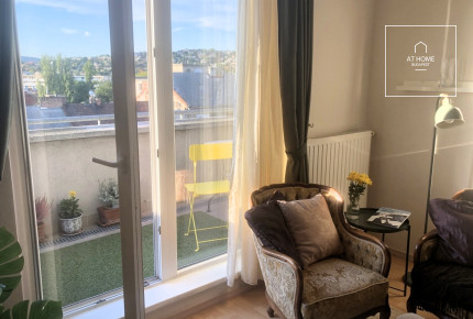 Top-Floor Apartment with Panoramic Views and 25 m² Terrace in District XI