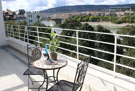 Panoramic two-bedroom penthouse with winter garden and concierge  services in District 13