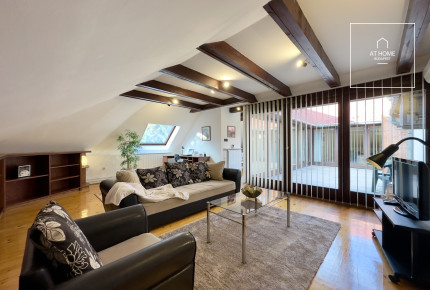 Attic apartment with a garage space in District II, Szemlőhegy