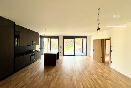 Newly built first-floor apartment with a balcony and garden access for rent in District XII
